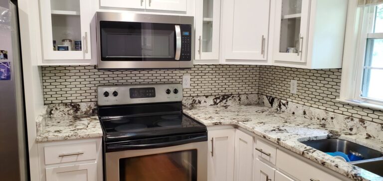 Black and white mosaic tile backsplash, Chattanooga, TN by Palacios Installation