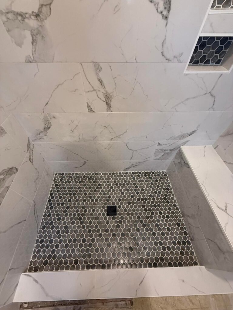 Hexagon mosaic shower floor with a niche, Chattanooga, TN by Palacios Installation