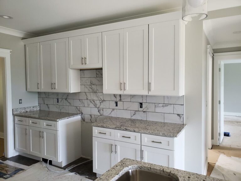 Kitchen with marble-look tile backsplash, Chattanooga, TN by Palacios Installation