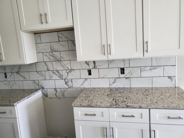 Large marble-look subway tile backsplash, Chattanooga, TN by Palacios Installation