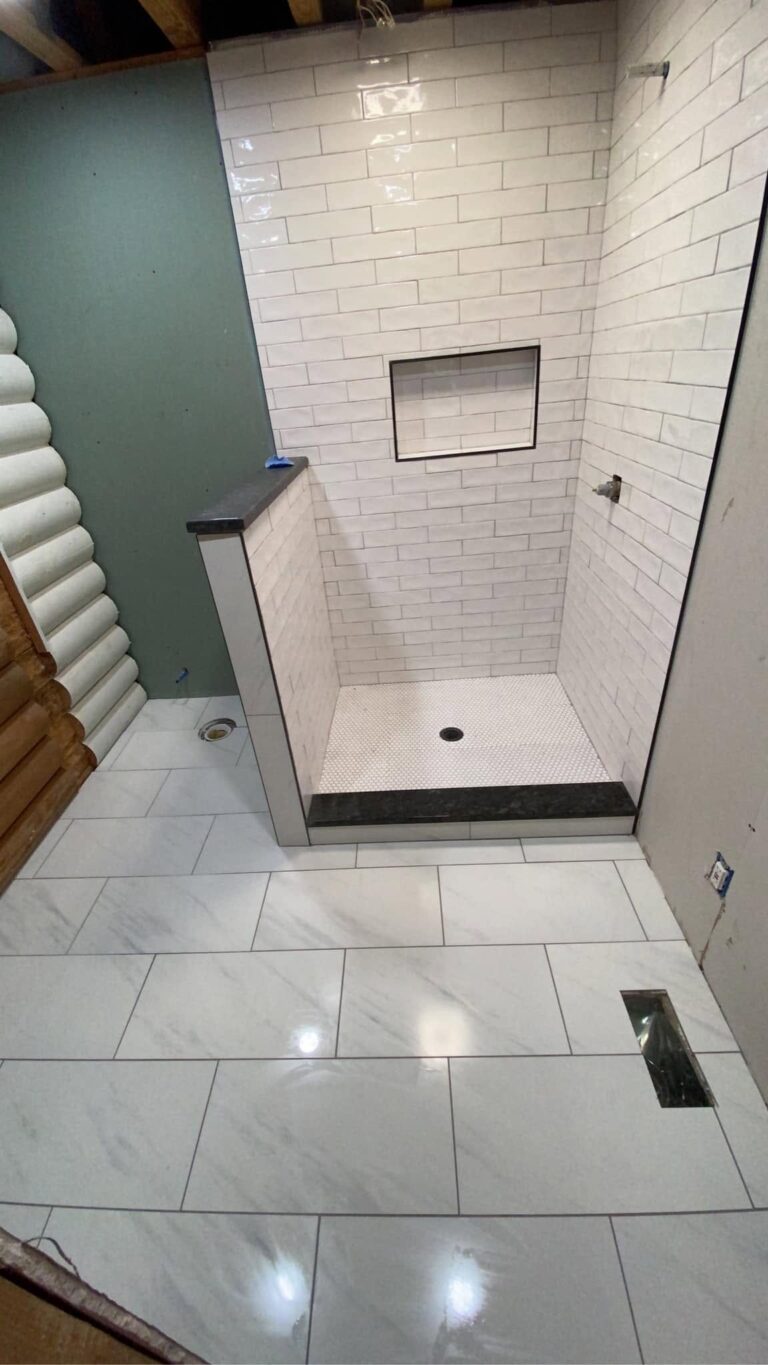 White subway tile shower with a recessed niche, Chattanooga, TN by Palacios Installation