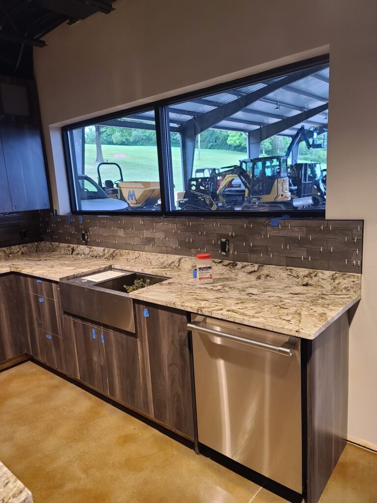Plank tile backsplash under a window, Ringgold, GA by Palacios Installation